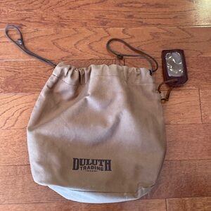 Duluth Trading Co brown canvas and leather tag plaid lined cinch tote bag men